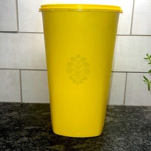 New Vintage Servalier yellow 10” tall canister with lid. In brand new condition